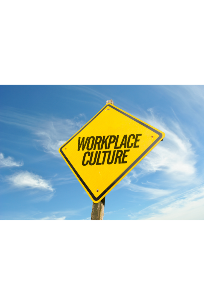 Image of a yellow signpost against a blue sky with clouds with the words - workplace culture written in black